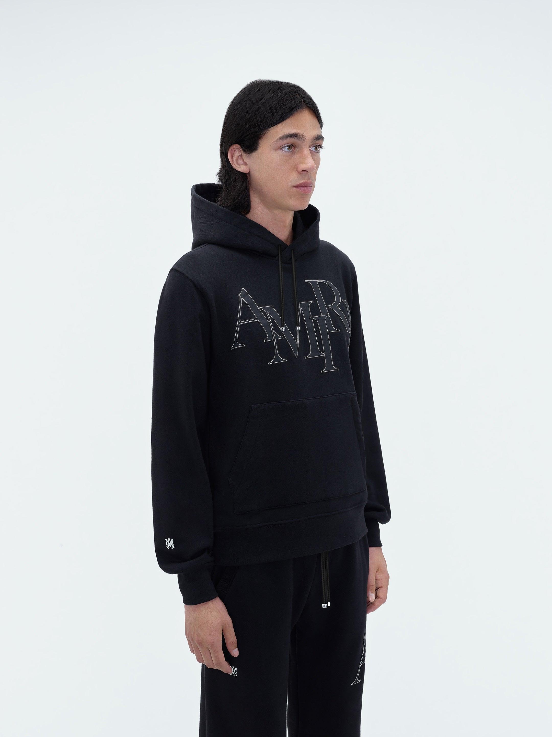 AMIRI STAGGERED LOGO HOODIE - Black Male Product Image