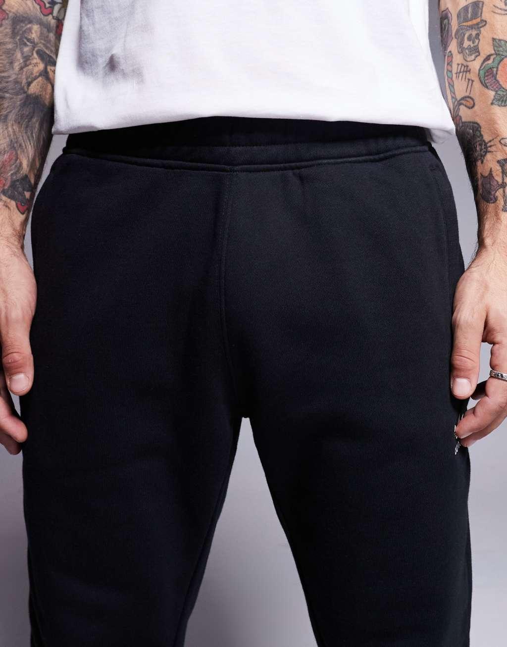 adidas Originals essential track pants in black Product Image