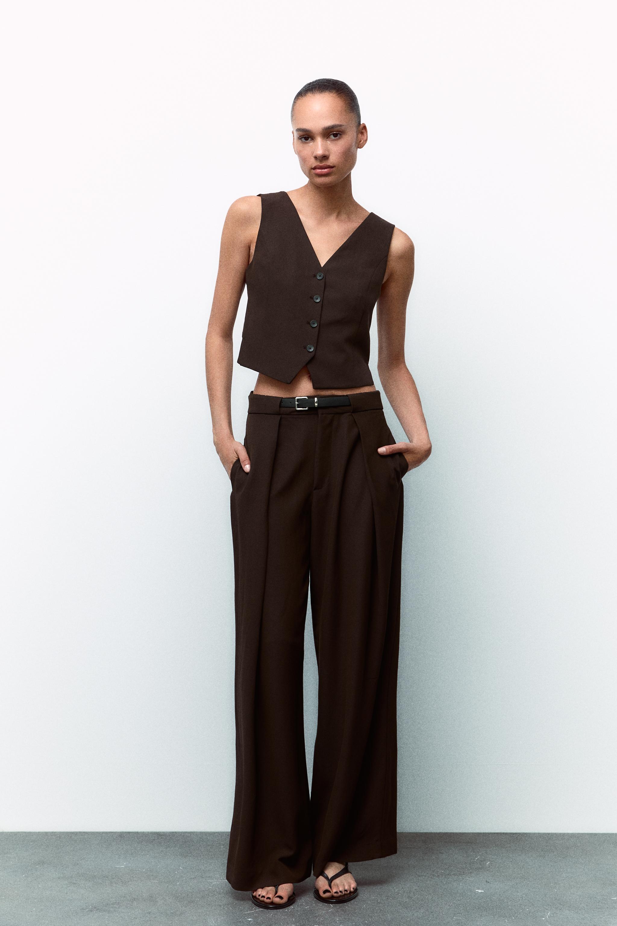 PLEATED PANTS WITH BELT Product Image