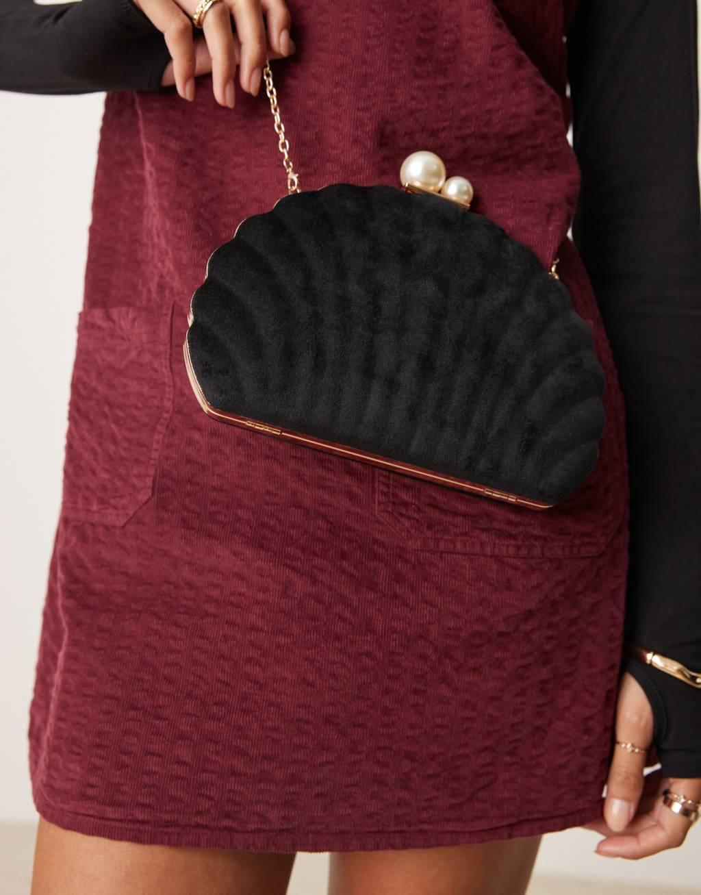 True Decadence velvet shell clutch bag with pearl clasp in black Product Image