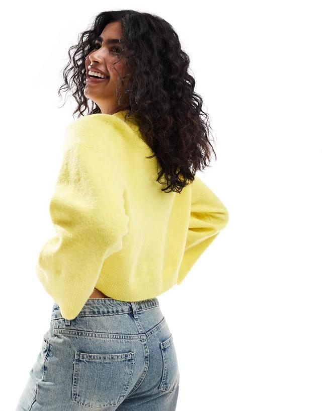 ASOS DESIGN crew neck boxy sweater with wide cuffs in yellow Product Image