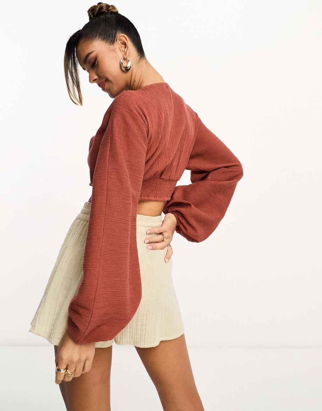 ASOS DESIGN long sleeve crinkle top with lace up lattice detail in rust Product Image