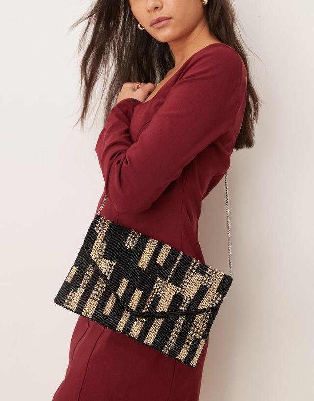 True Decadence beaded envelope clutch bag in black and gold Product Image