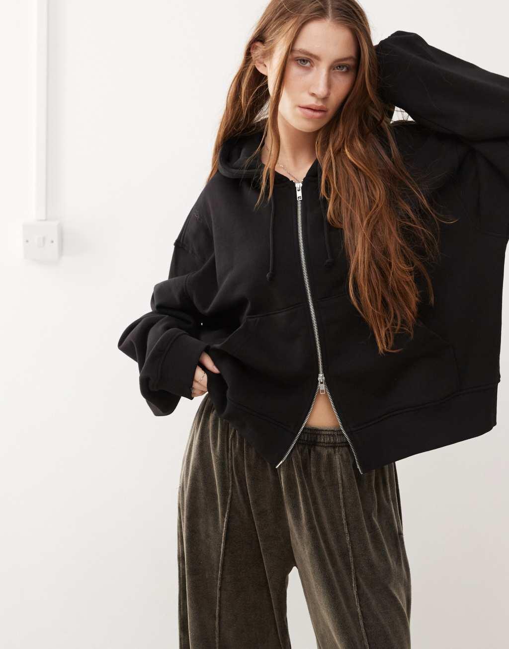 Weekday Essence boxy zip thru hoodie in black Product Image