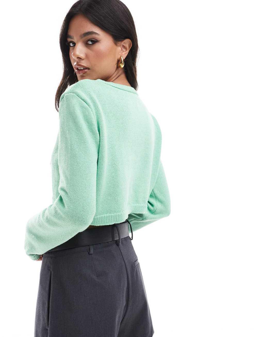 ASOS DESIGN cropped cardi with gold buttons in green Product Image