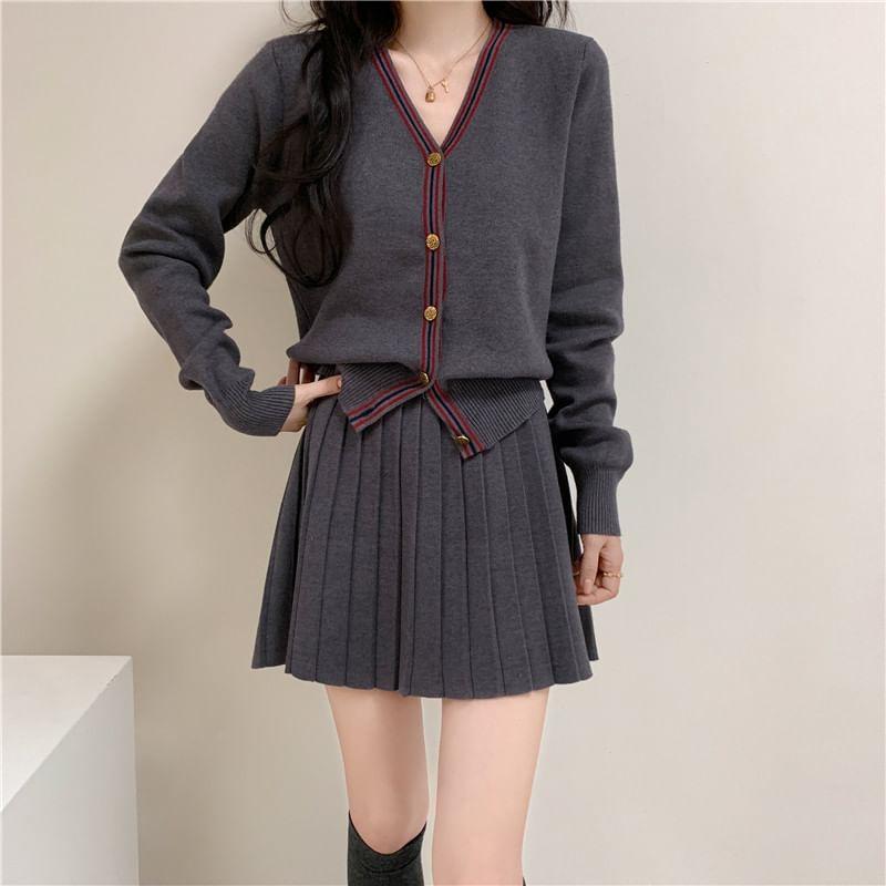 Set: V-Neck Contrast Trim Button-Up Cardigan + High Waist Plain Pleated Knit Mini A-Line Skirt Product Image