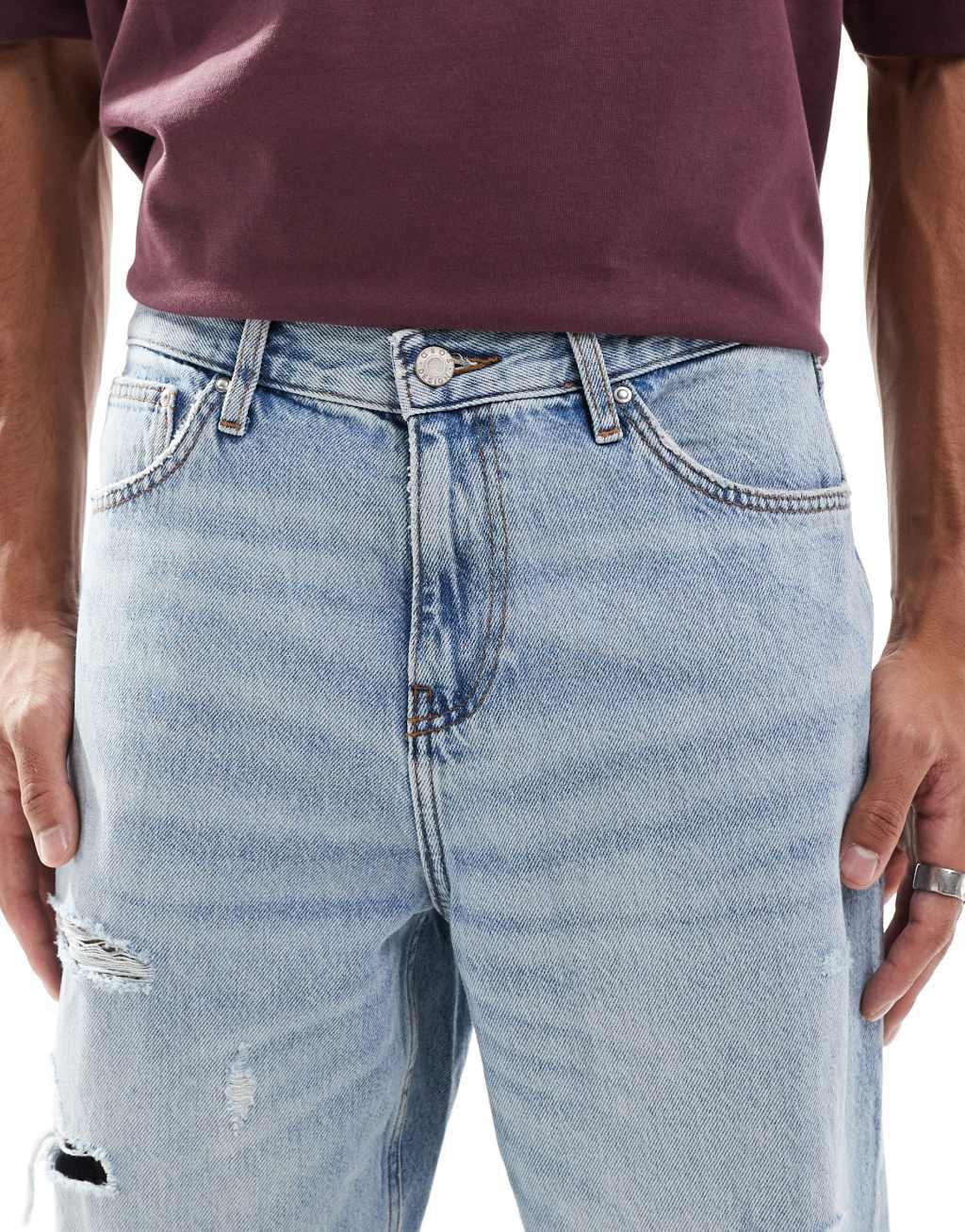 ASOS DESIGN baggy jeans in light wash with rips Product Image