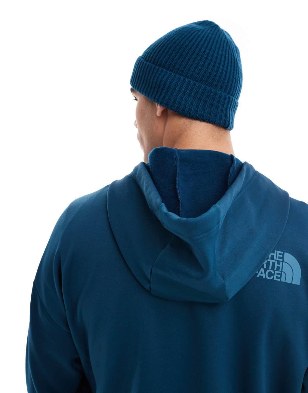 The North Face Logo Box cuffed beanie in petrol blue Product Image