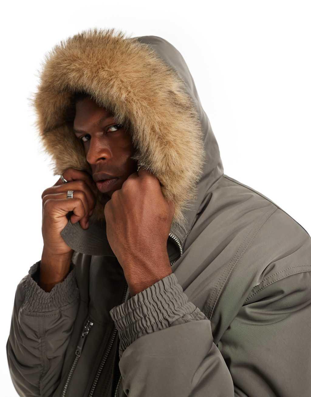 Weekday padded bomber jacket with faux fur hood in khaki Product Image