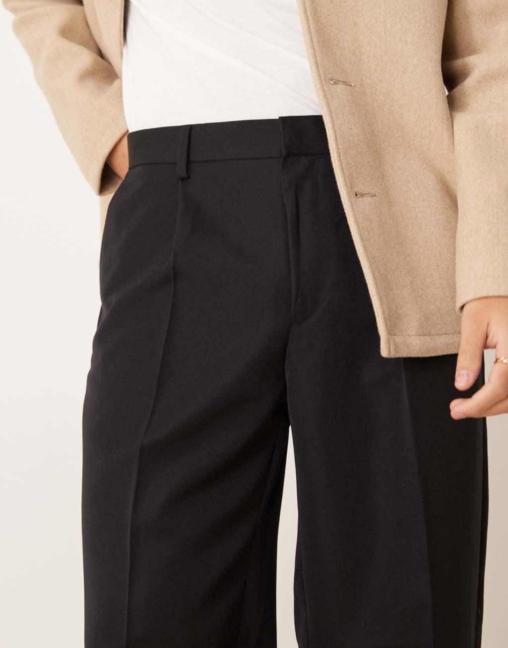 ASOS DESIGN smart oversized tapered pants with front pleat in black Product Image