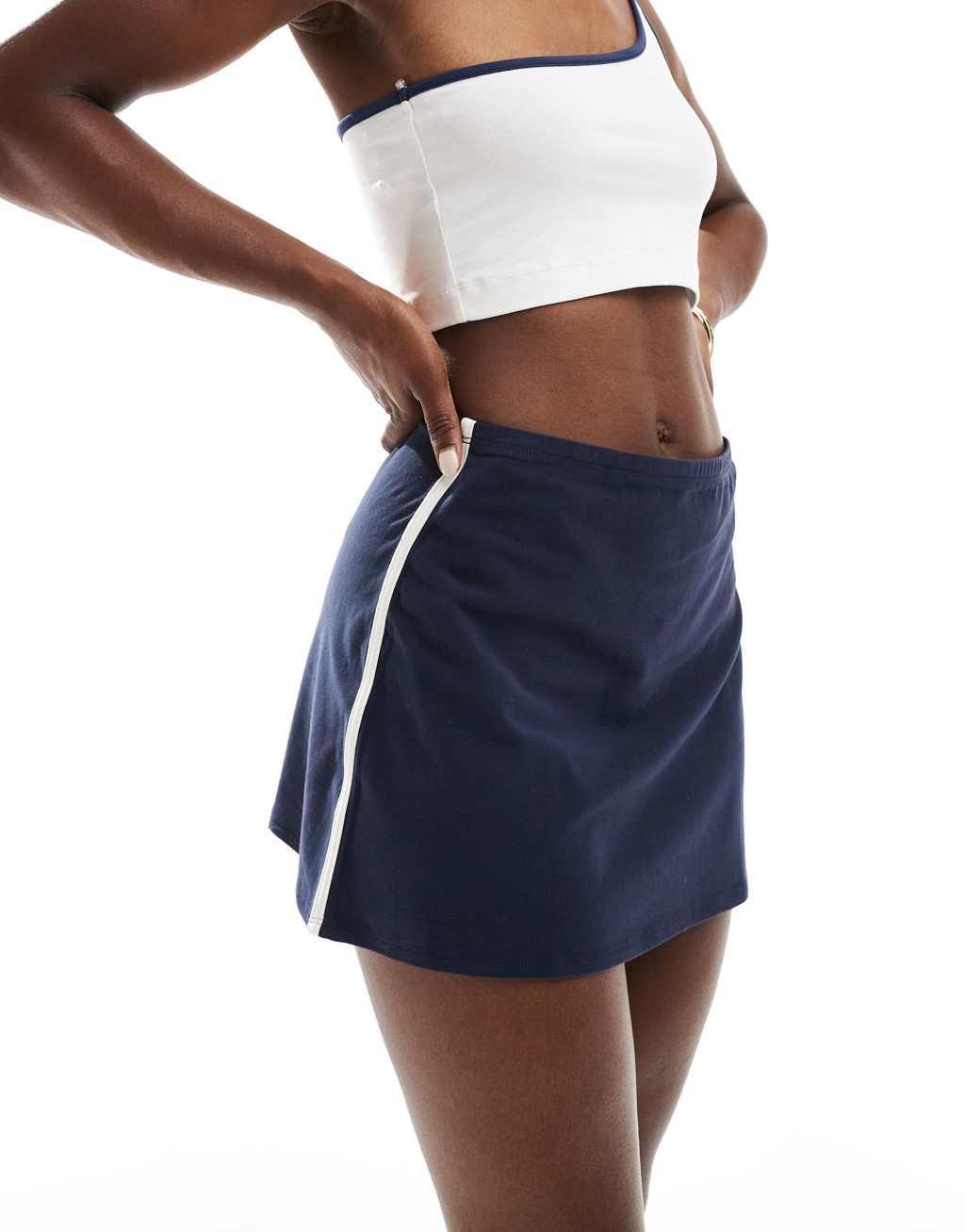 Cotton On mini sport skirt in navy with white stripe Product Image