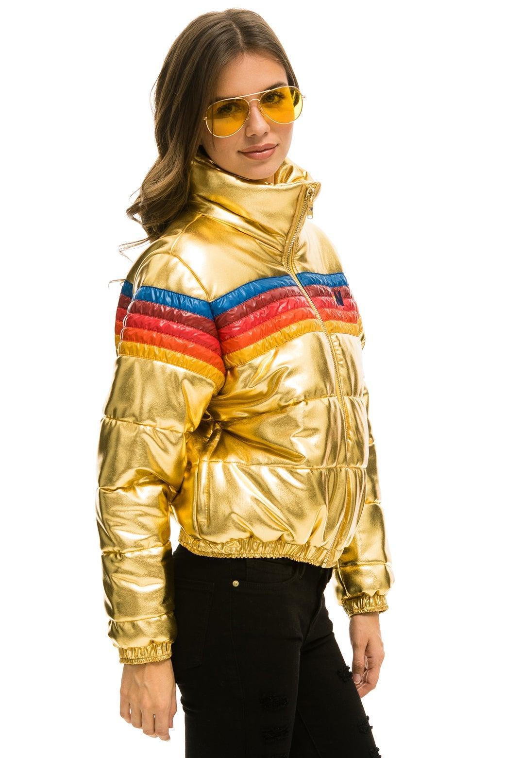 5 STRIPE LUXE APRES PUFFER JACKET - GLOSSY GOLD Female Product Image