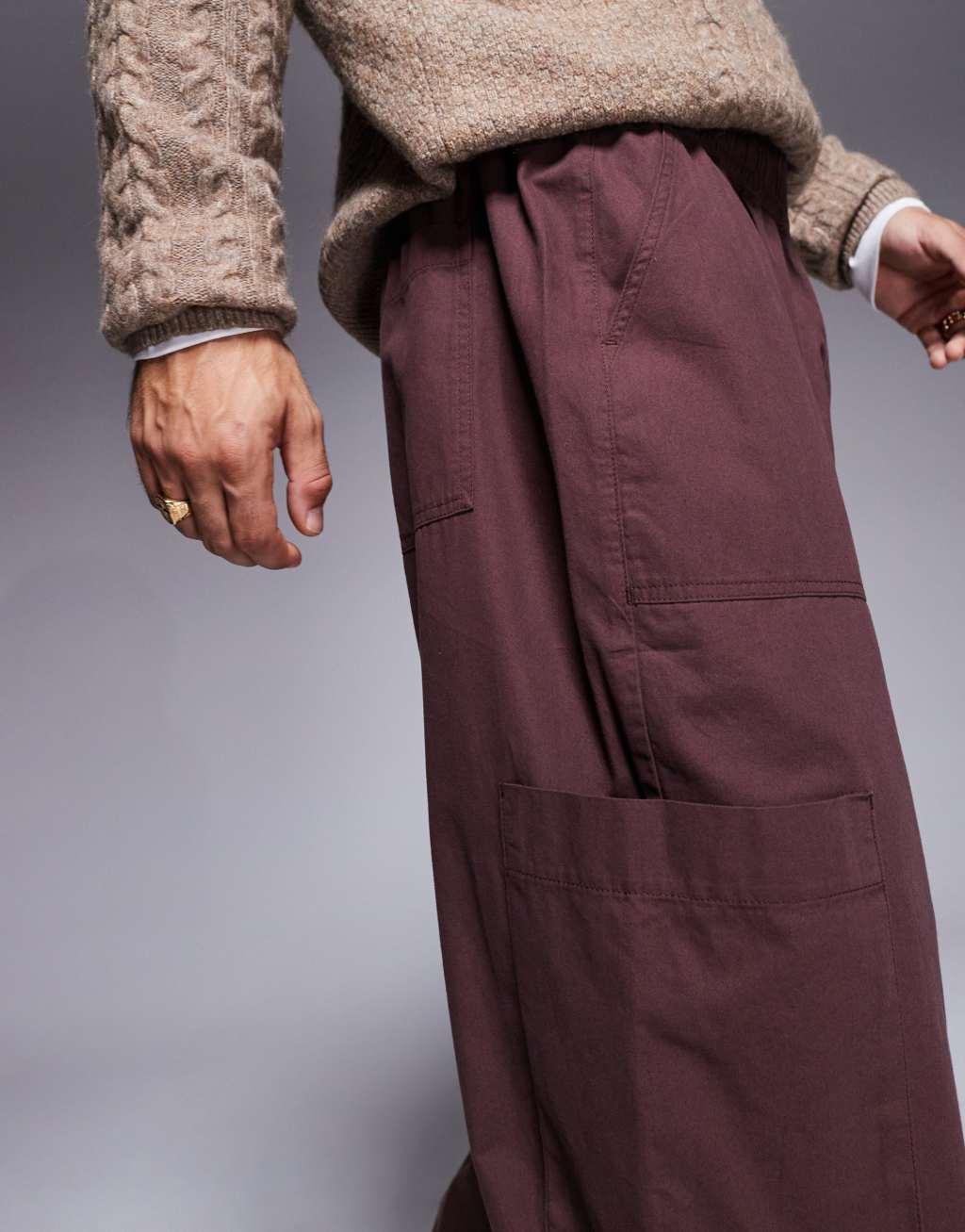 ASOS DESIGN oversized balloon cargo pants with elasticated waist in brown Product Image