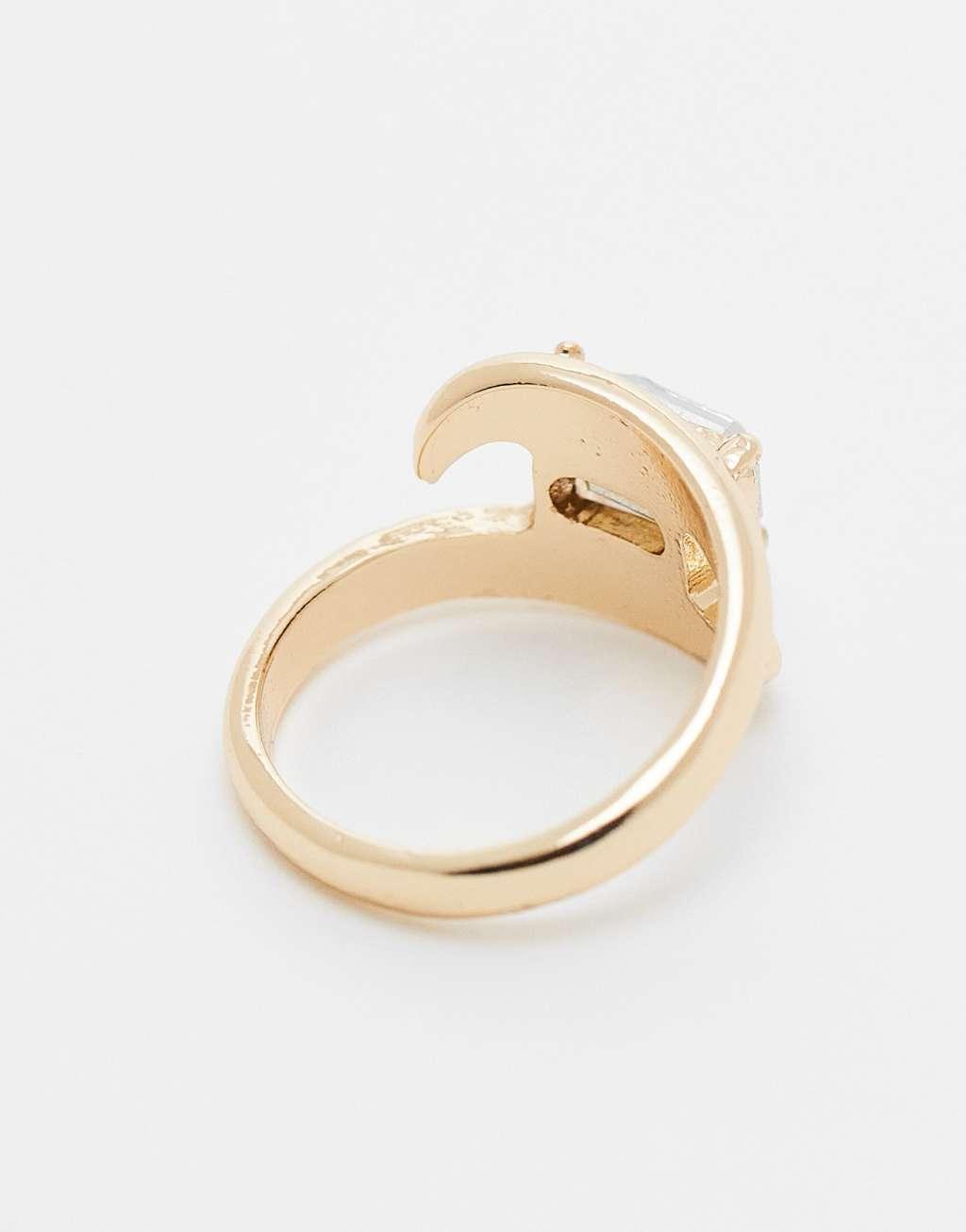 ASOS DESIGN ring with wrap around crystal detail in gold tone Product Image