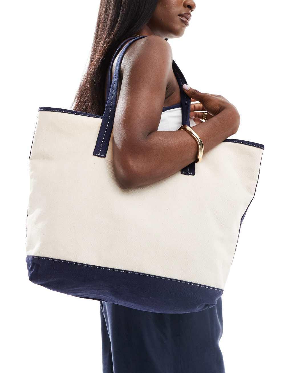 ASOS DESIGN canvas tote bag with contrast detail in navy blue Product Image