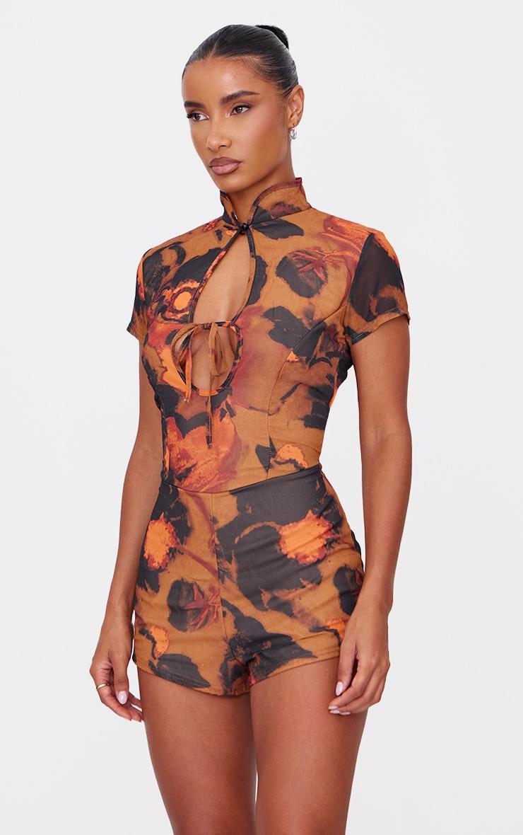 Multi Print Keyhole Cut Out Tie Romper Product Image