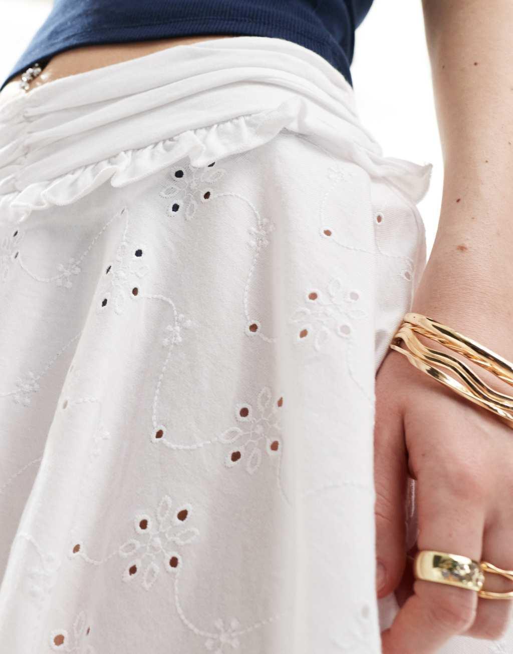 ASOS DESIGN handkerchief hem eyelet rara skirt in white Product Image