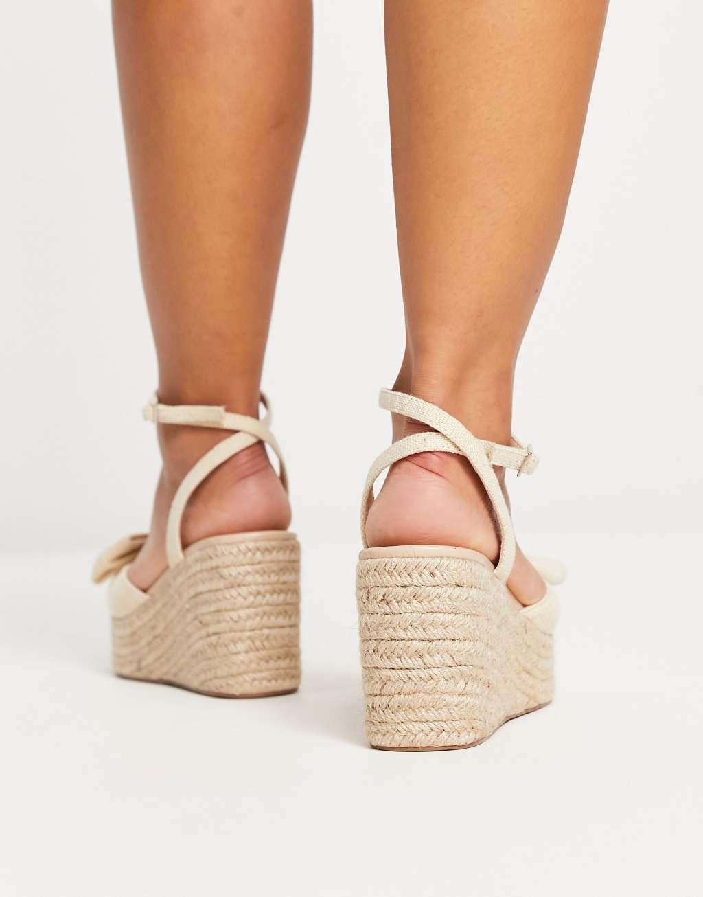 ASOS DESIGN Wide Fit Trisha bow detail espadrille wedges in natural fabrication Product Image