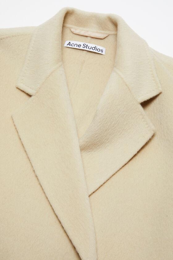 Double-breasted wool coat Product Image