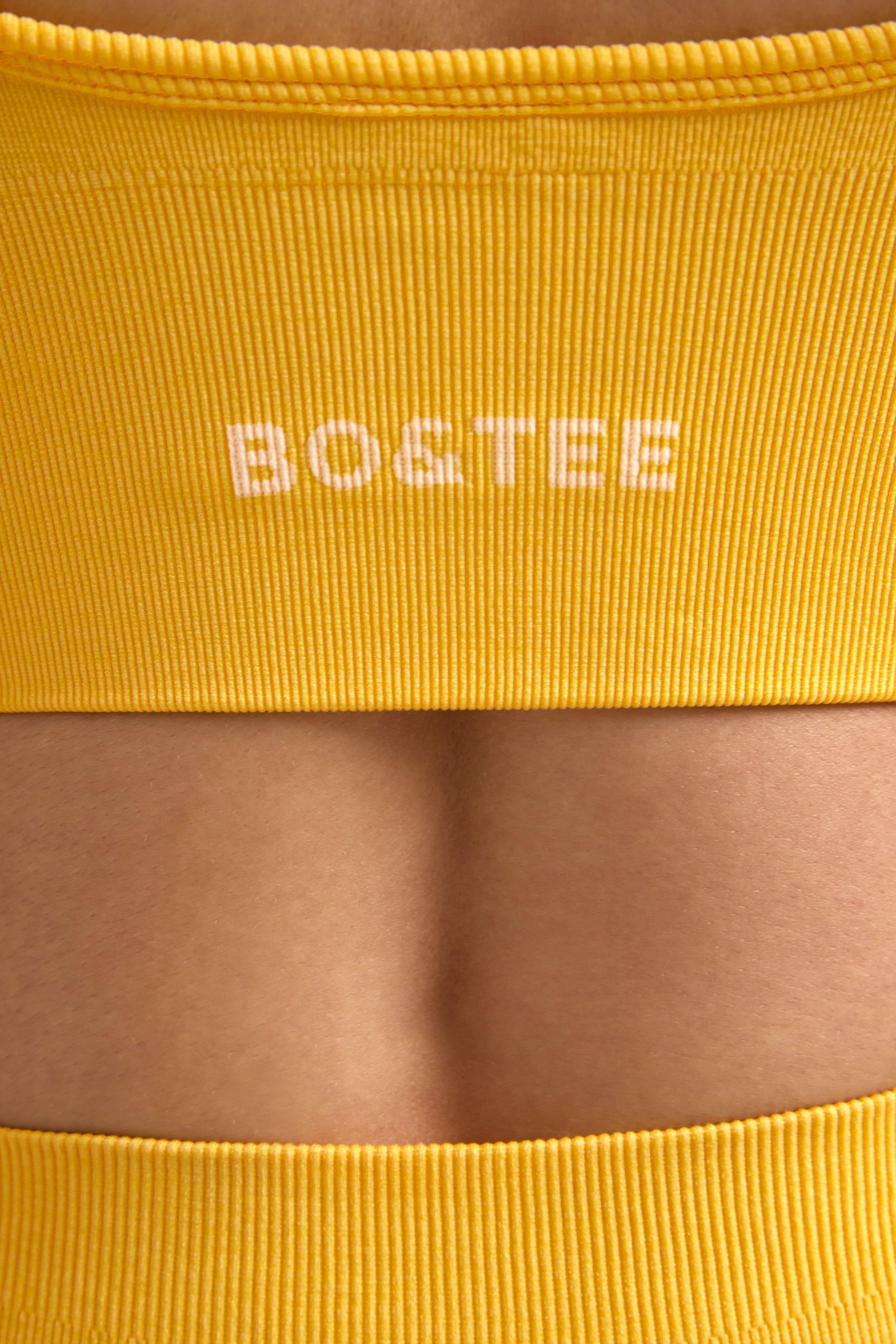 Define Luxe V-Neck Sports Bra in Golden Yellow Product Image