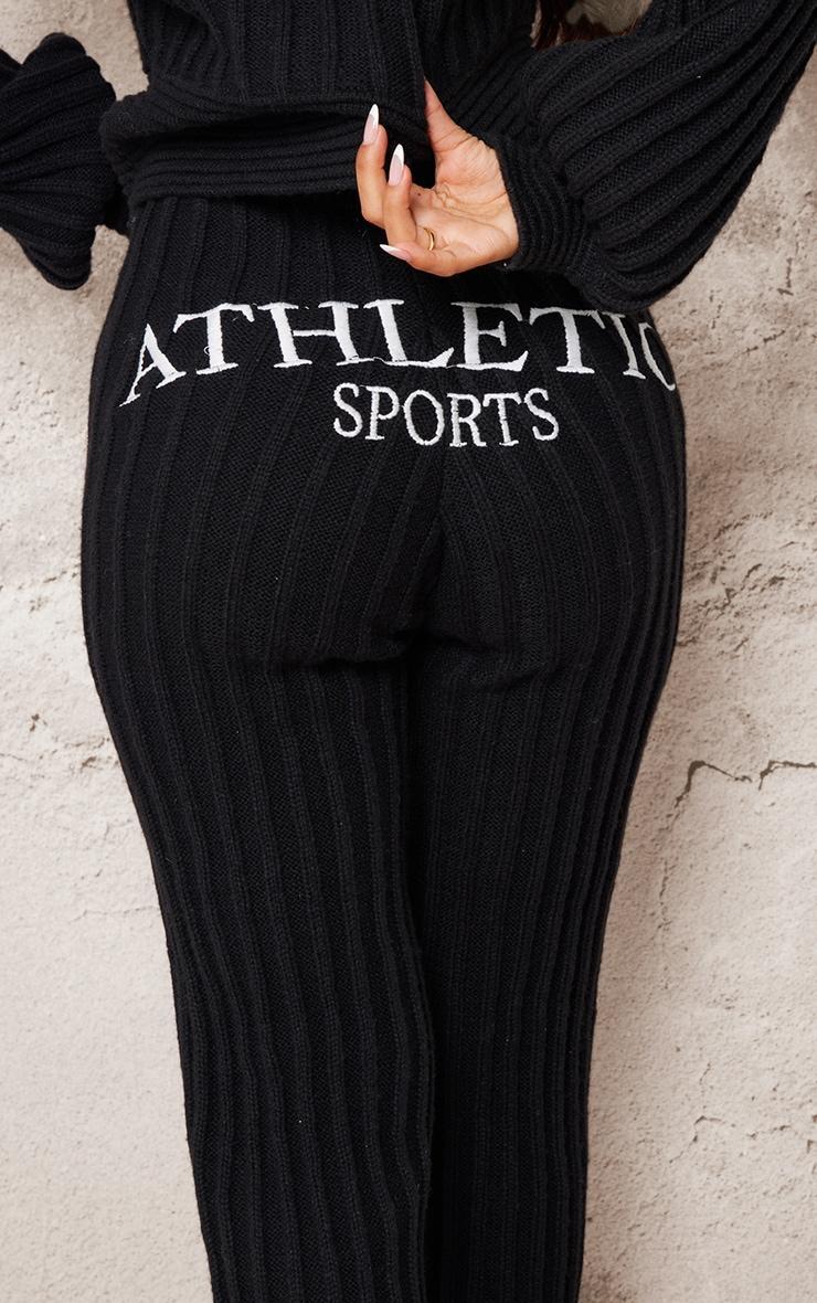 Petite Black Athletic Sport Embroidered Knit Flared Pants Product Image