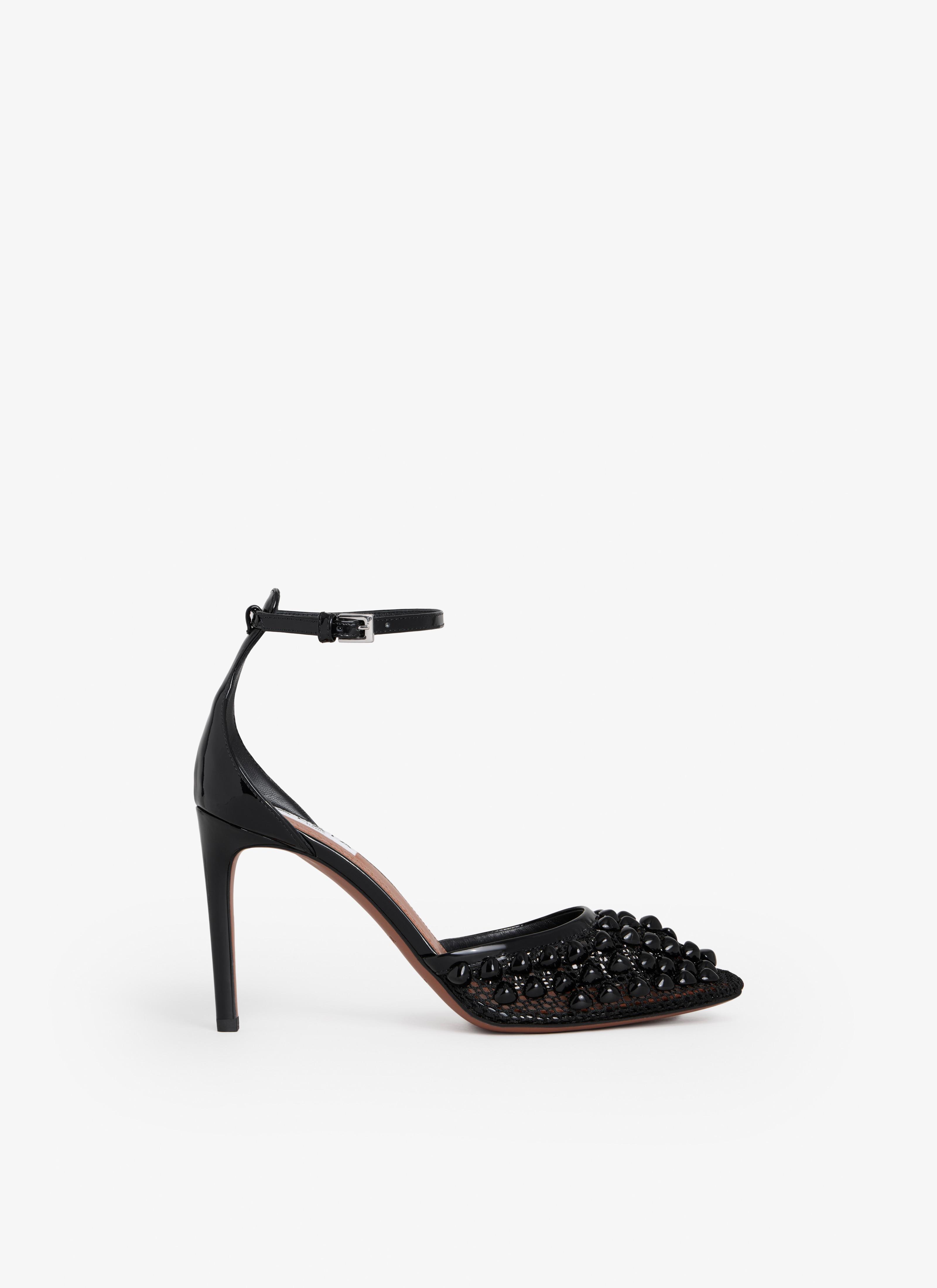 Black HIGH FISHNET PUMPS WITH STUDS product image