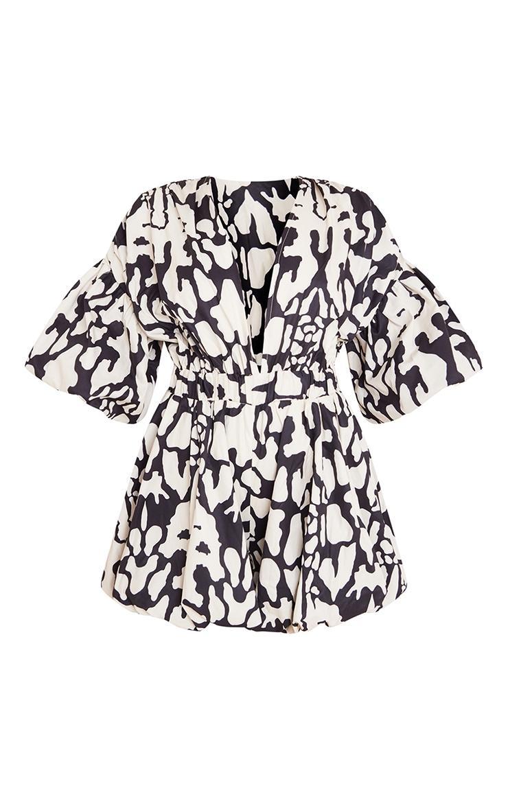 Black Print Plunge Puffball Hem Romper Product Image