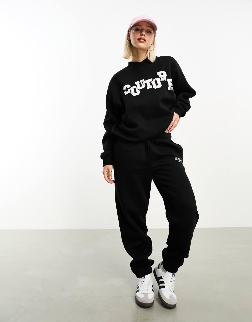 The Couture Club applique sweatpants in black product image