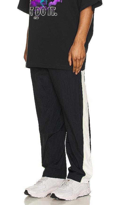 Nike Woven Pant in Black. Product Image