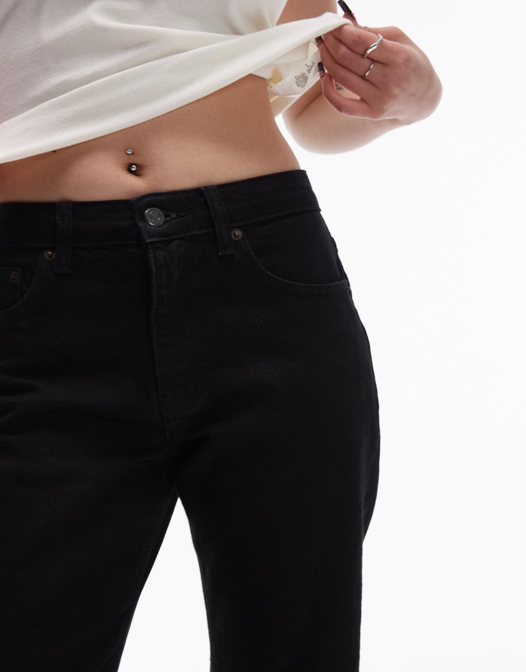 Topshop Petite cropped mid rise straight jeans with raw hems in black Product Image