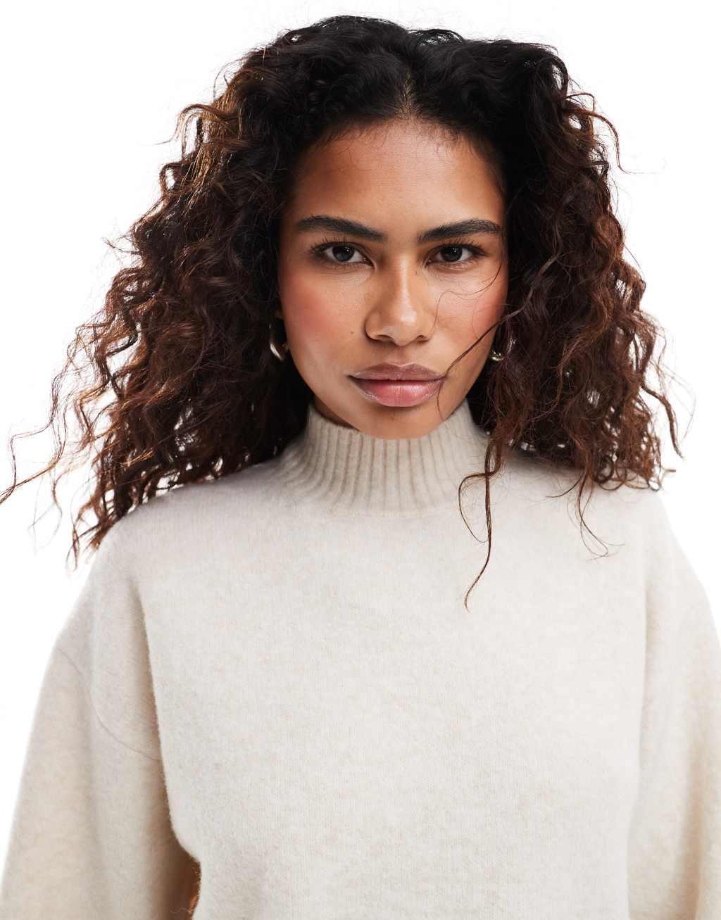 Monki knitted turtleneck sweater in beige melange Product Image