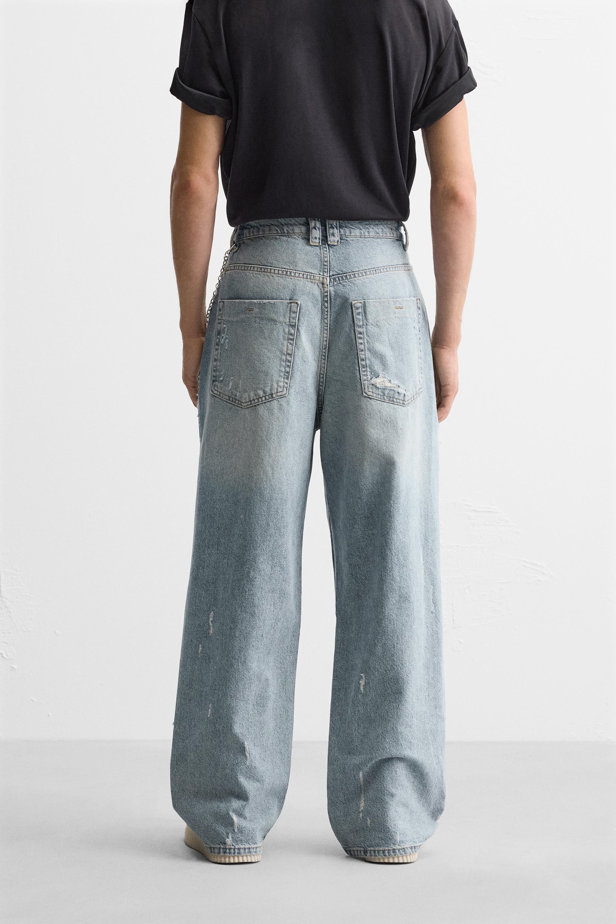 RIPPED EXTREME WASHED JEANS Product Image