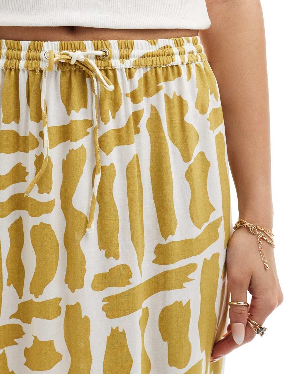 ASOS DESIGN tie waist midi skirt in mustard squiggle print Product Image