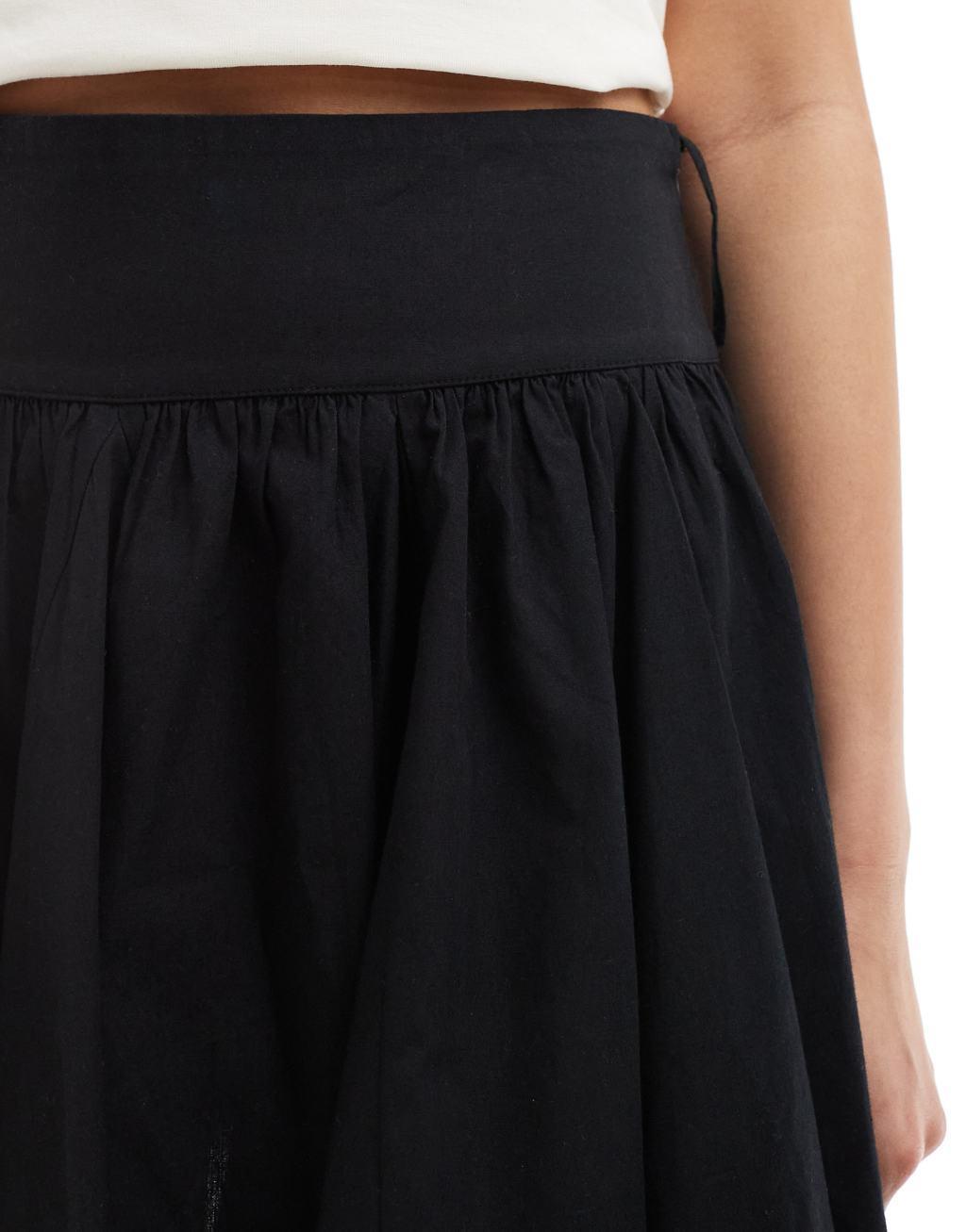 COLLUSION cotton flippy mini skirt in black Product Image