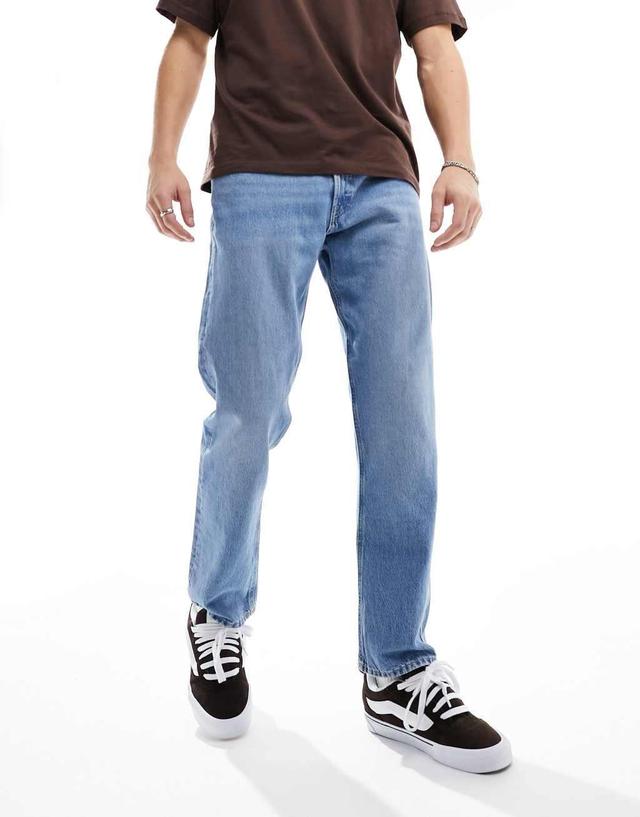 Jack & Jones Chris relaxed fit jeans in mid blue wash  Product Image