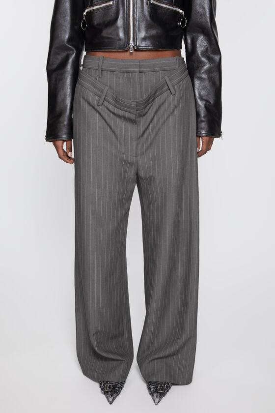 Deconstructed pinstripe trousers Product Image