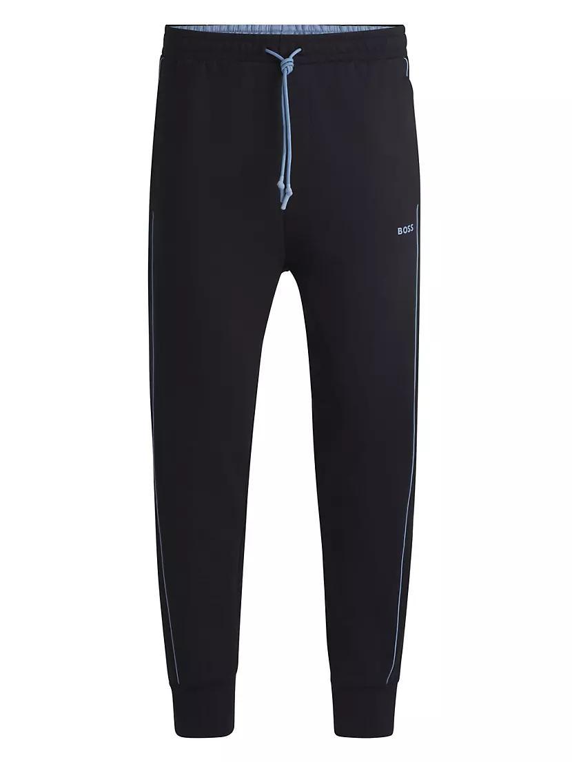 Stretch-Cotton Tracksuit Bottoms with Embossed Artwork Product Image