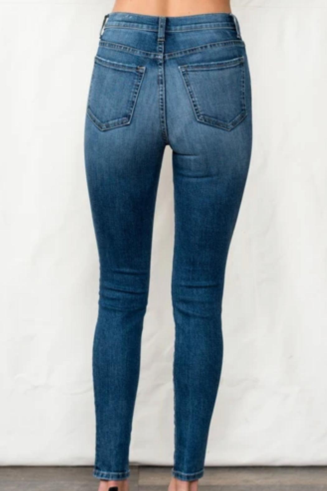 Mid Rise Skinny Jean With Distressing Female Product Image