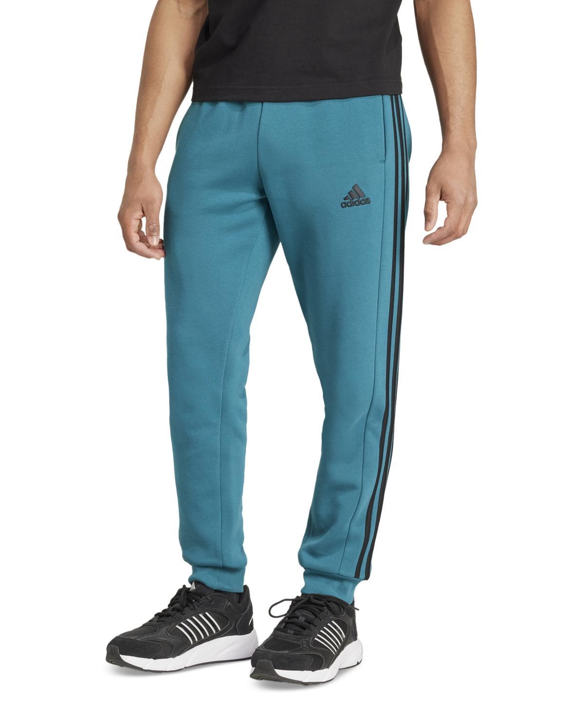 adidas Essentials Fleece Tapered Cuffed 3-Stripes Pants (Ink) Men's Clothing Product Image