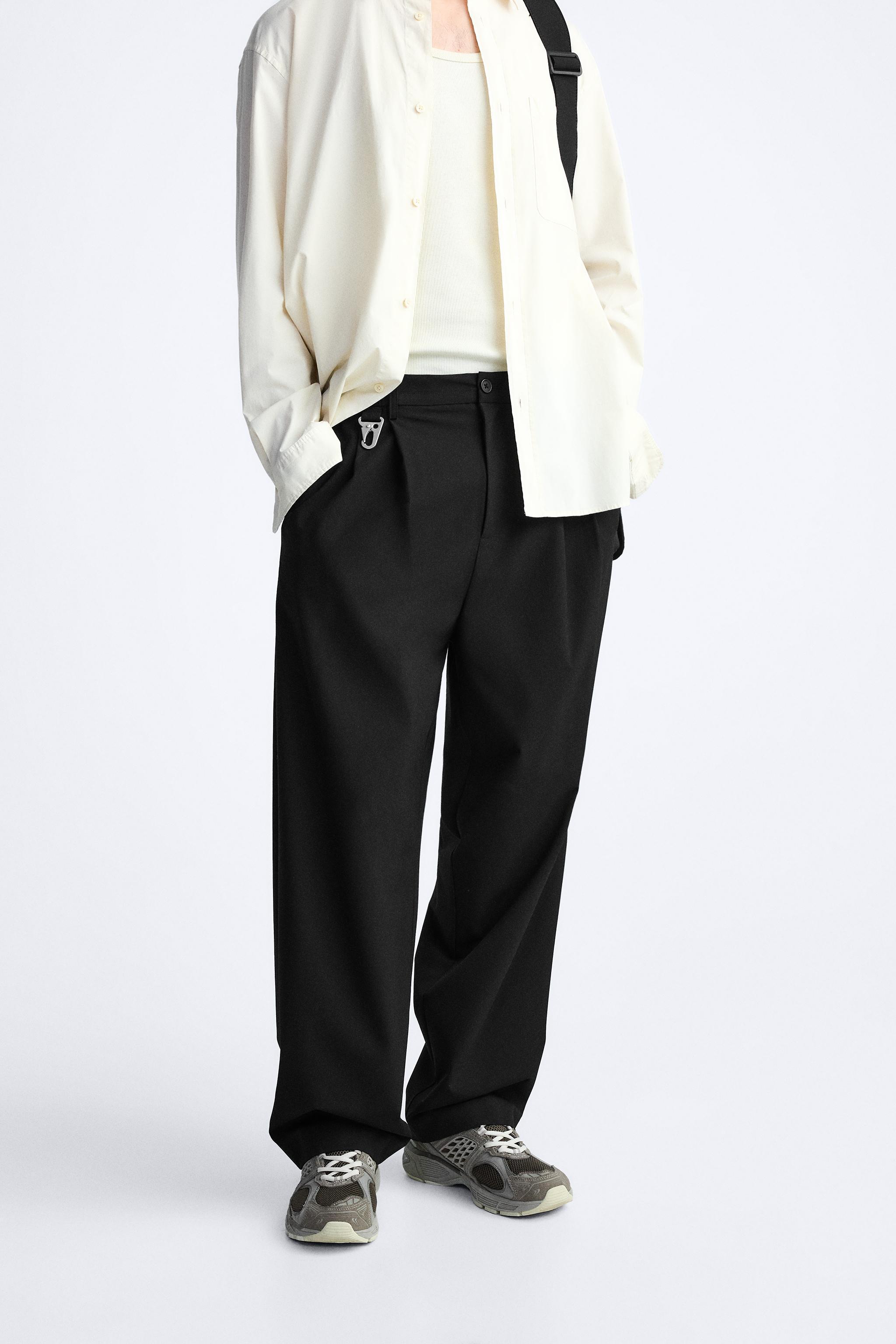 PLEATED WIDE FIT PANTS Product Image