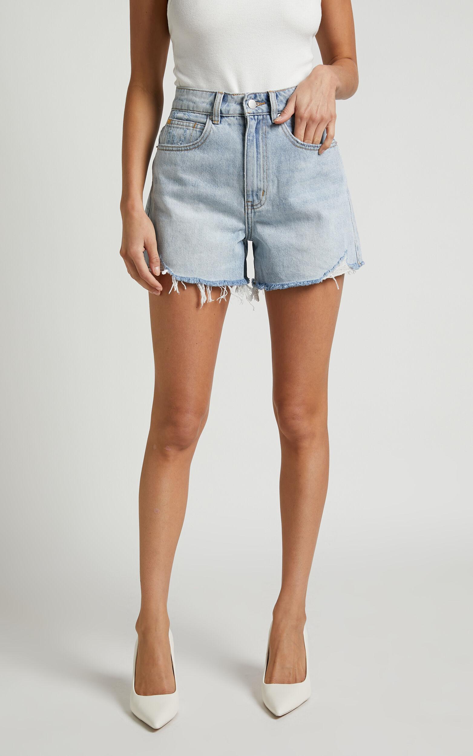 Eloisa Shorts - Recycled Cotton Raw Hem Denim Shorts in Mid Blue Wash Product Image