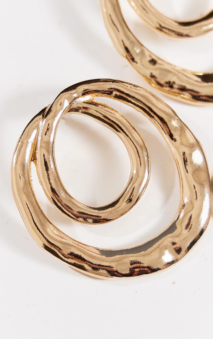 Gold Molten Swirl Round Statement Earrings Product Image