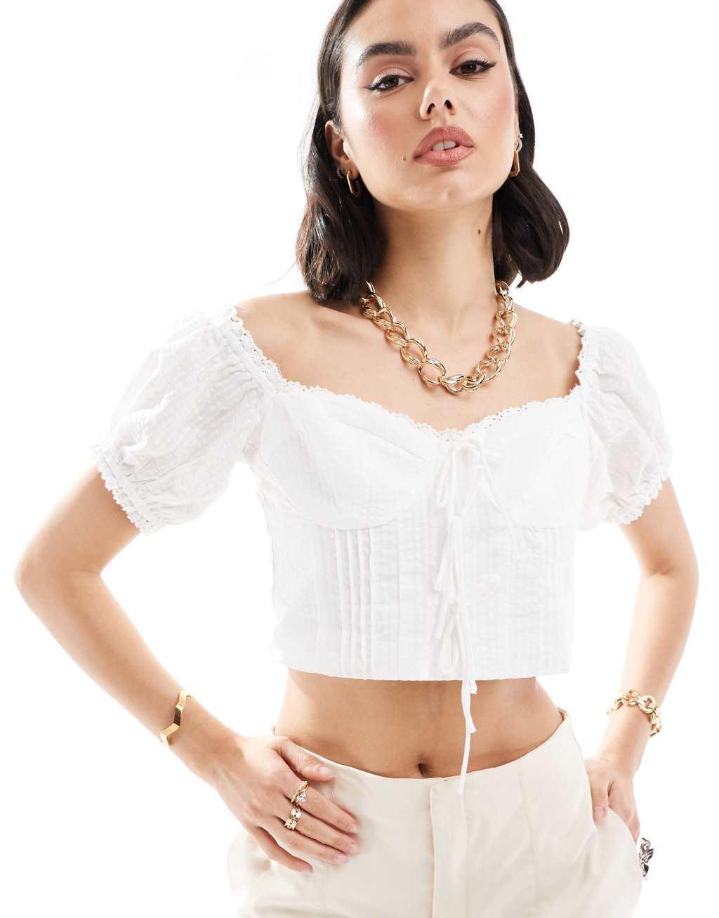 Mango puff sleeve bow front top in white Product Image