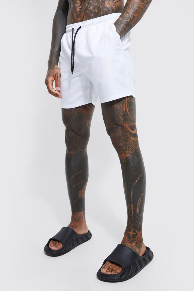 Mid Length Plain Swim Trunks | boohooMAN USA Product Image