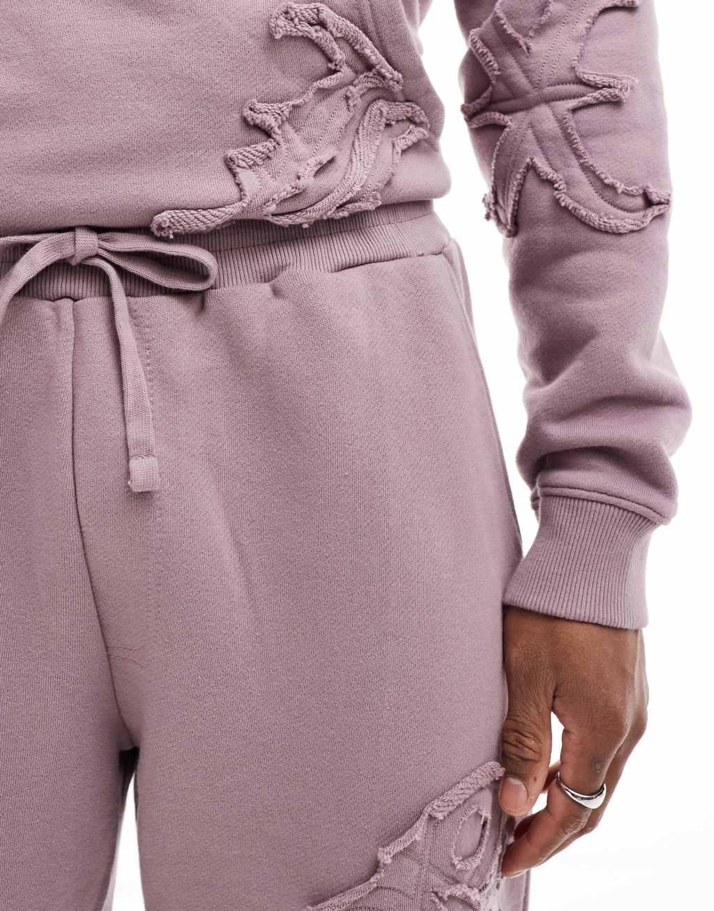 Liquor N Poker allover motif straight leg sweatpants in berry mix - part of a set Product Image