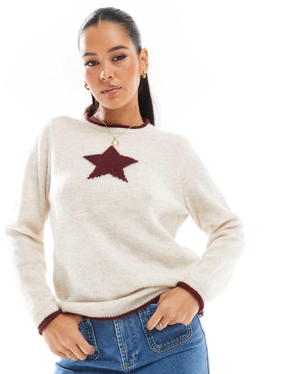 ASOS DESIGN oversized sweater with star graphic in cream and red Product Image