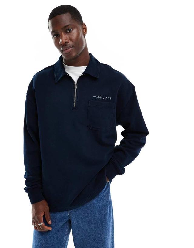 Tommy Jeans small logo 1/4 zip sweatshirt in washed navy Product Image