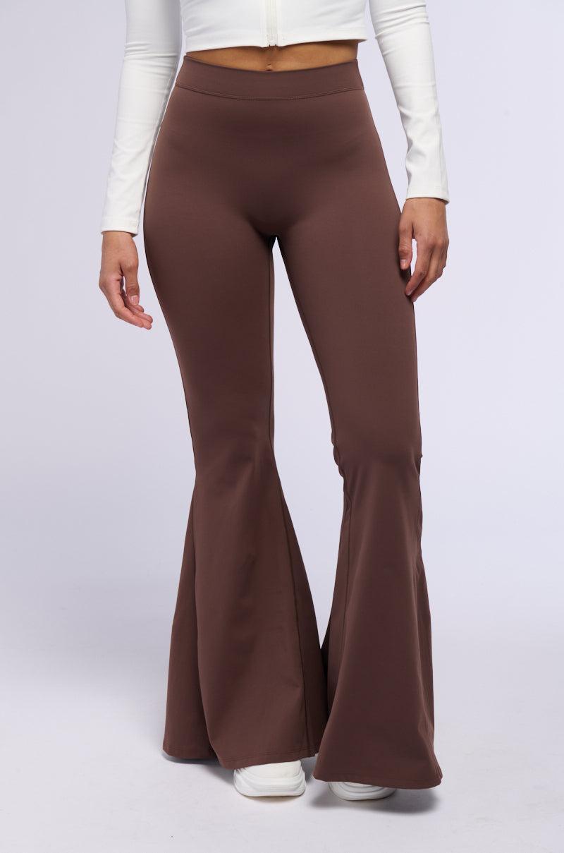 ON THE RUN RUCHED BACK FLARE LEGGING IN BROWN product image