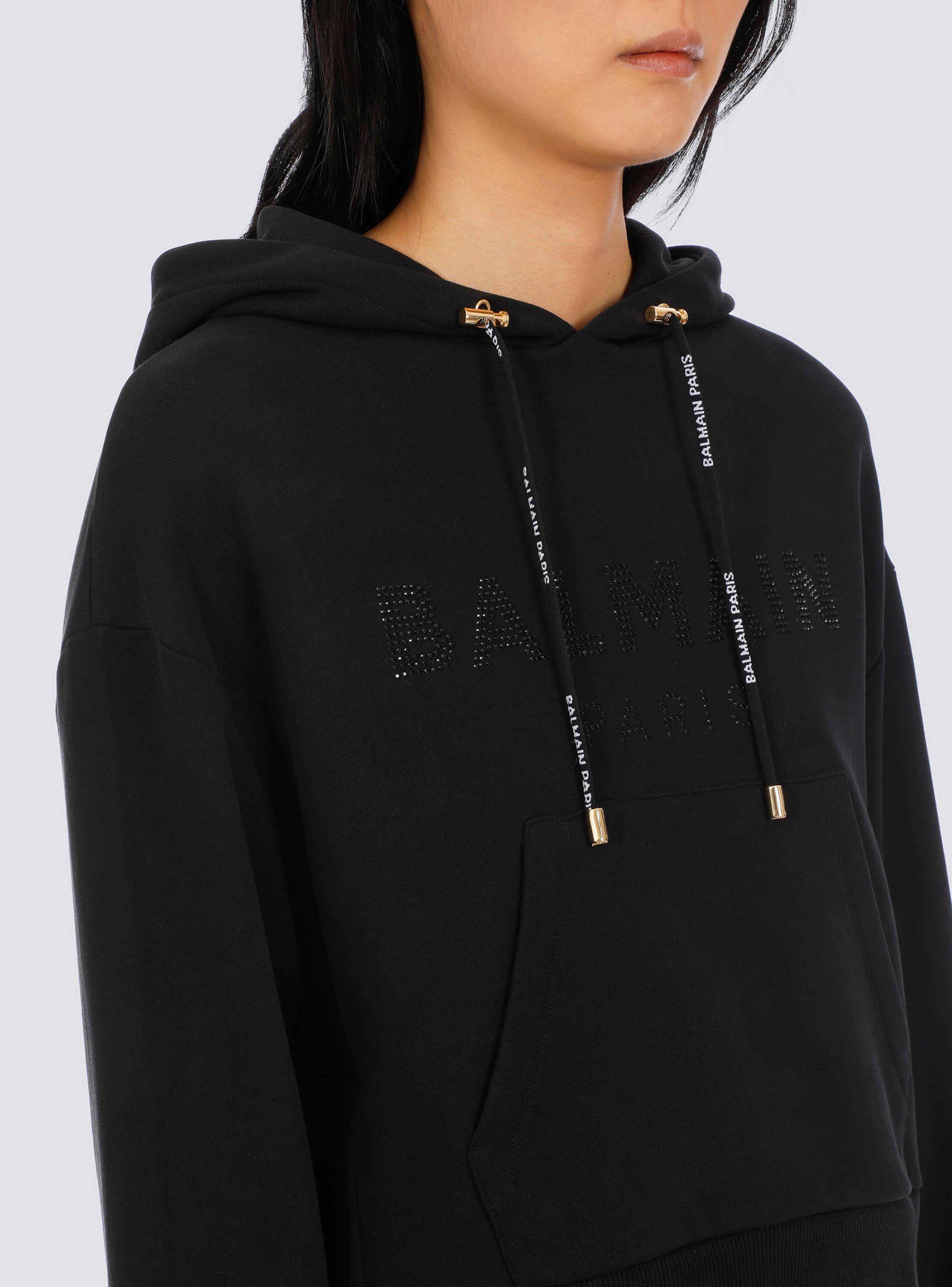 Cropped eco-designed cotton sweatshirt with rhinestone Balmain logo Product Image