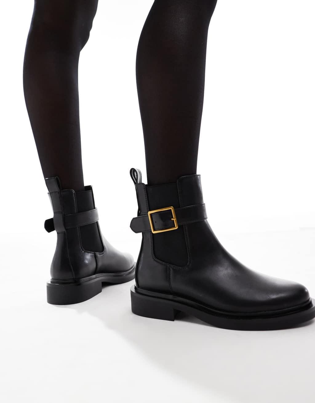 ASOS DESIGN Wide Fit Aurora flat boots with buckle strap in black Product Image